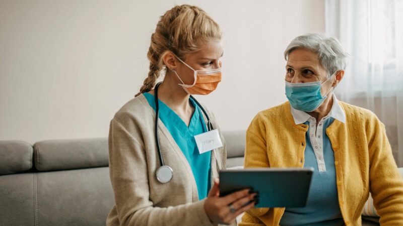 Senior woman visited by home care specialist